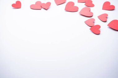 Paper hearts on a white background, with space for text. Valentine's Day. Mother's day background. Love concept.	