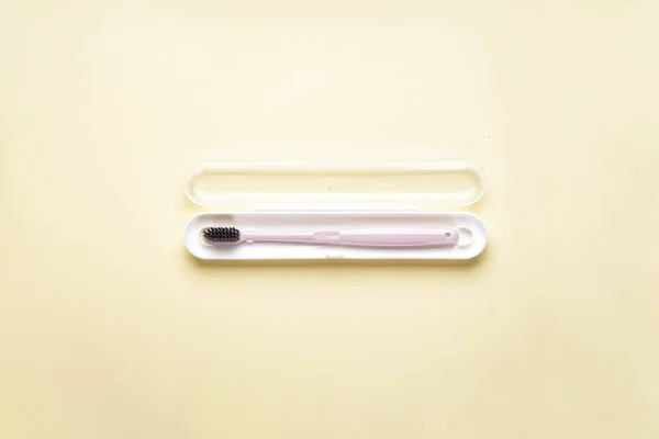 Pink Toothbrush Case Yellow Background Flat Lay Composition — Stock Photo, Image