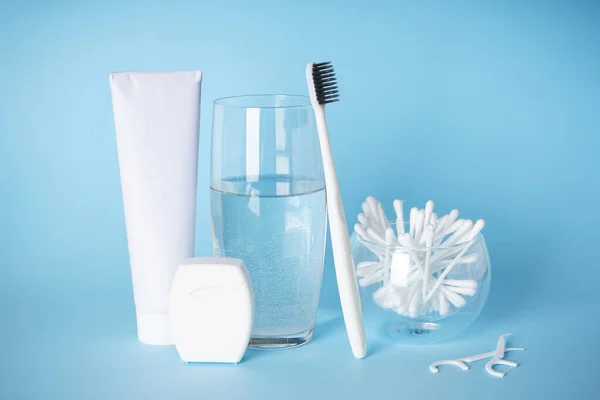 Toothbrush Glass Water Oral Care Products Blue Background Dental Morning — Stock Photo, Image