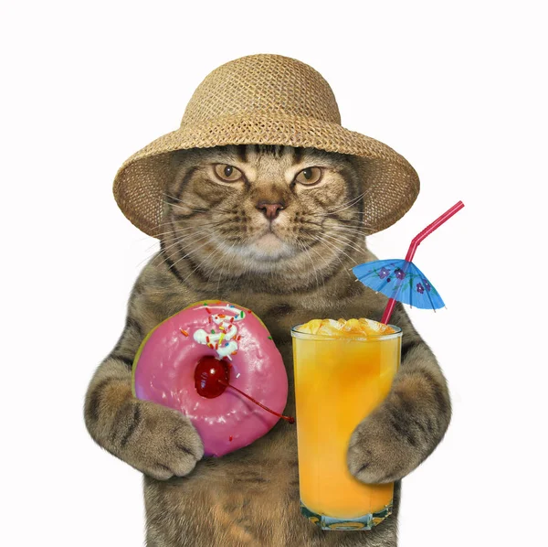 Cat with pink donut and juice Royalty Free Stock Photos