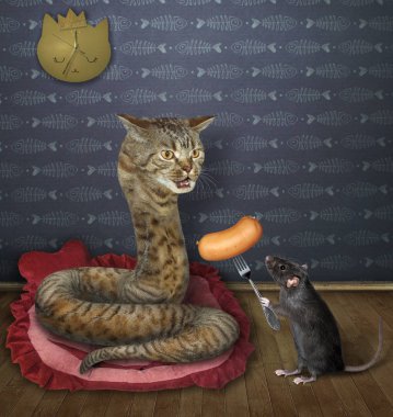 Fare kedi yılanına sosis verir.