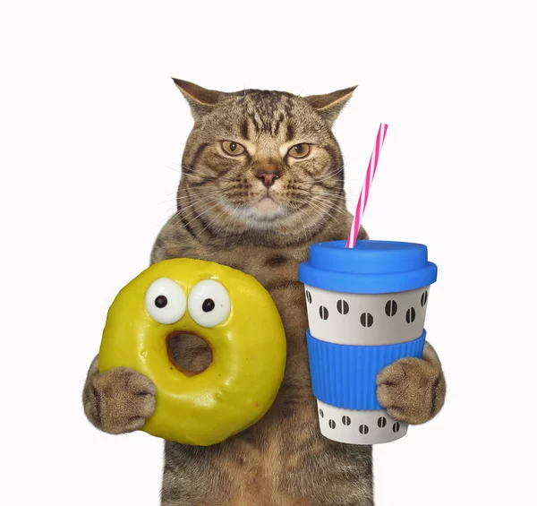 Cat with blue cup of coffee Royalty Free Stock Photos