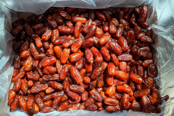 Dried dates in the box. Background.