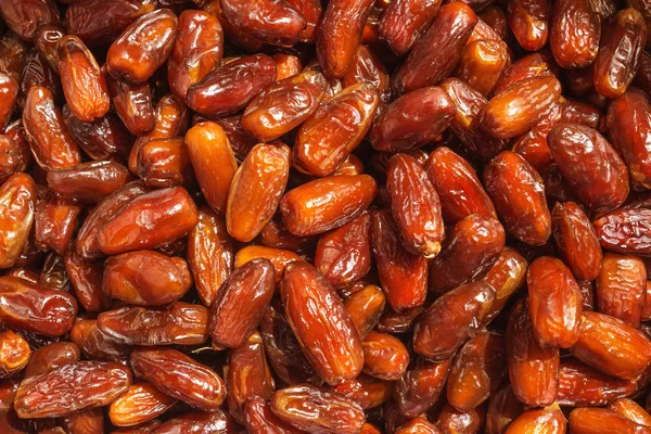 Dried dates in the box. Background.