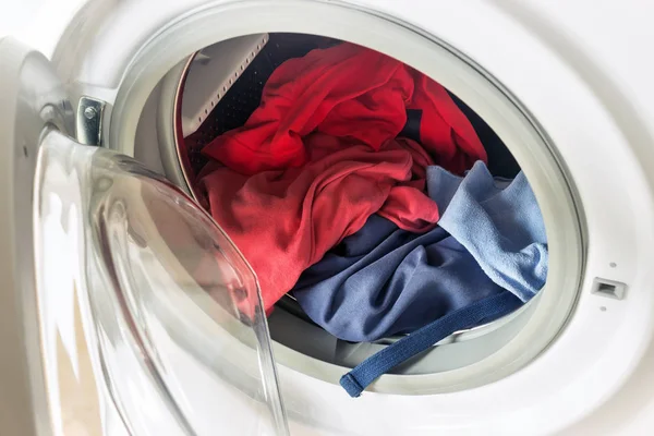 Clothing in washing machine.  Concept- laundry, housework — Stock Photo, Image