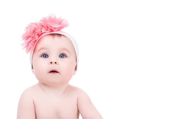 Retrato de linda niña con flor de arco rosa en su él — Foto de Stock