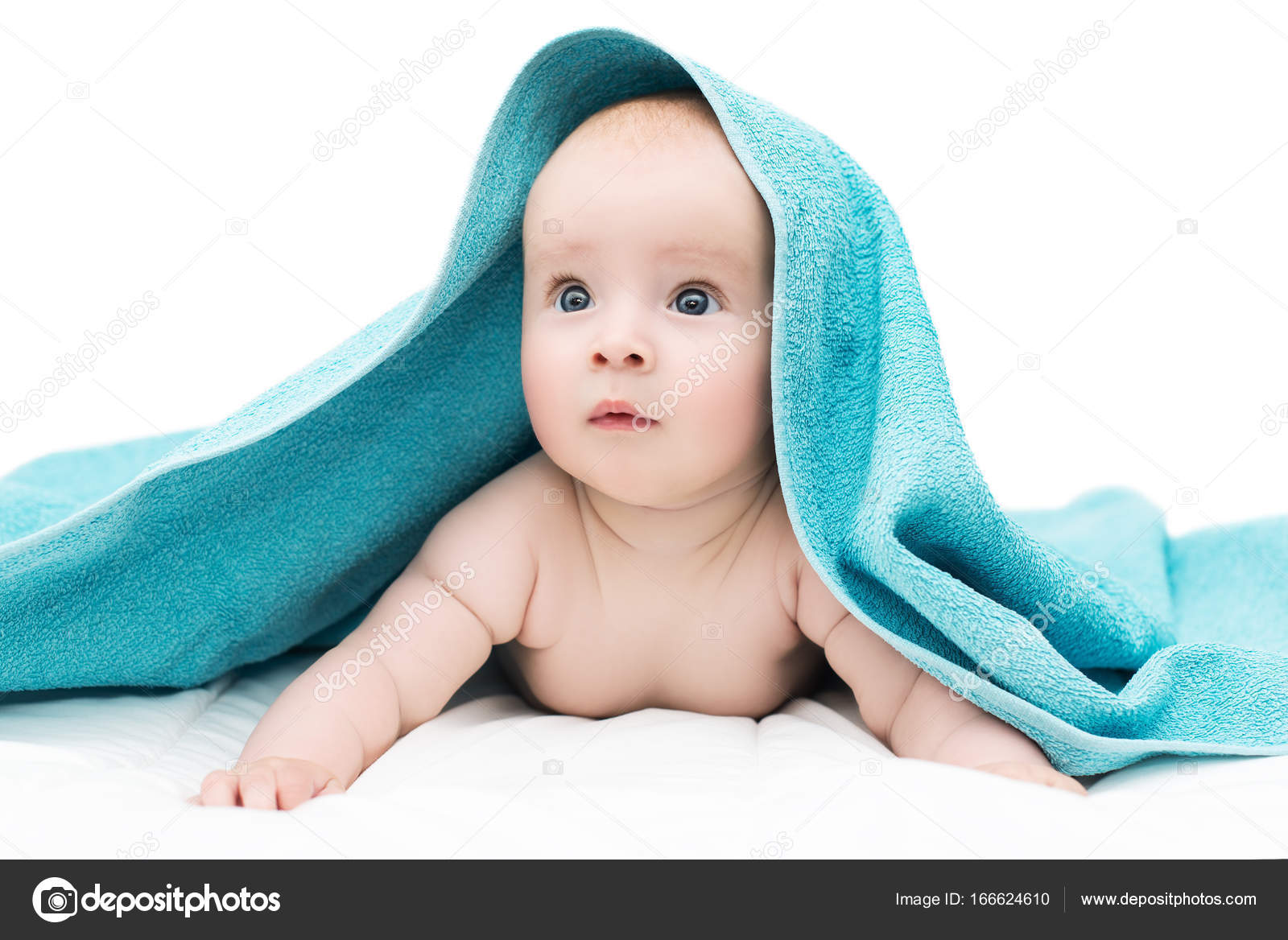 Cute baby after shower with blue towel on head Stock Photo irinalapet 166624610