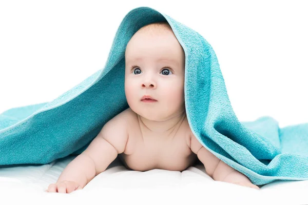 Cute baby after shower with blue towel on head — Stock Photo, Image