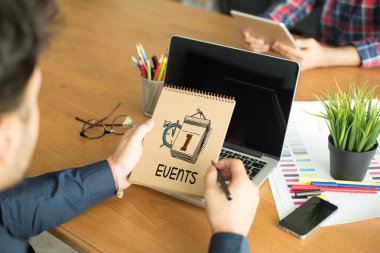 Not defteri tutan eller