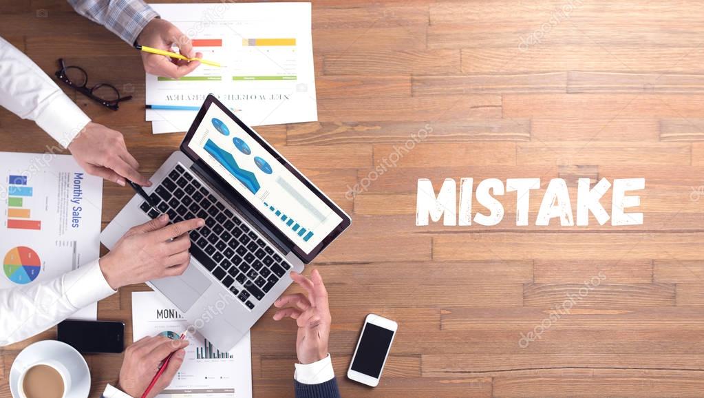MISTAKE concept, professionals team at work