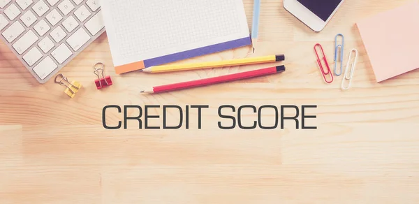 Milieu de travail avec le concept CREDIT SCORE — Photo