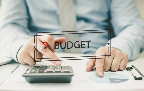 Accountant at work and sign — Stock Photo, Image