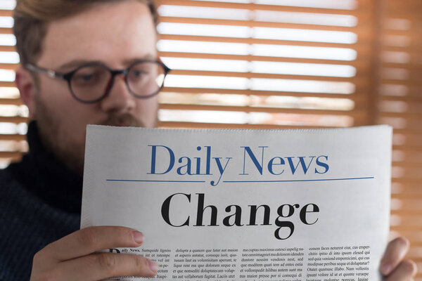 Man reading newspaper
