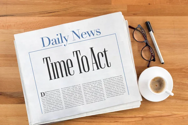 Newspaper and cup of coffee — Stock Photo, Image