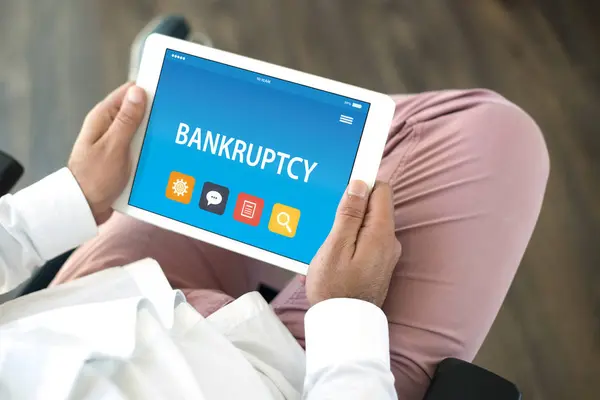 BANKRUPTCY ON TABLET PC SCREEN — Stok Foto