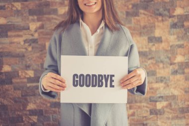 Woman presenting GOODBYE CONCEPT clipart