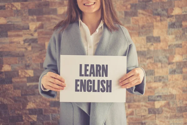 Woman presenting LEARN ENGLISH CONCEPT — Stock Photo, Image