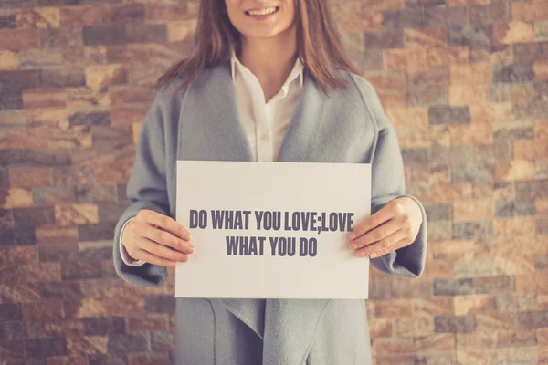 Woman presenting DO WHAT YOU LOVE CONCEPT