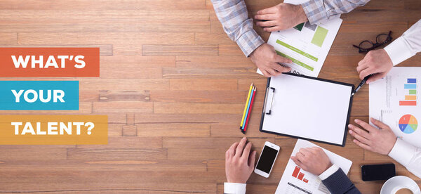  Businesspeople working at desk 