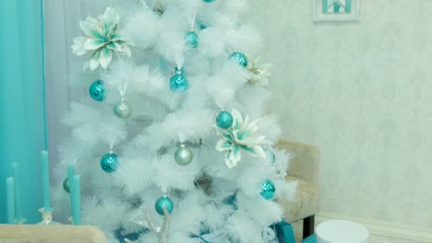 White Christmas tree decorated with gifts. Stock Video