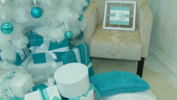 Presents under decorated Christmas tree. Royalty Free Stock Video