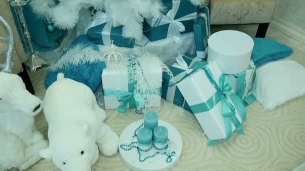 Presents under decorated Christmas tree. Stock Video