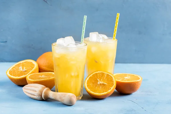 Glass of orange juice with ice cubes Cold orange fresh — Stock Photo, Image