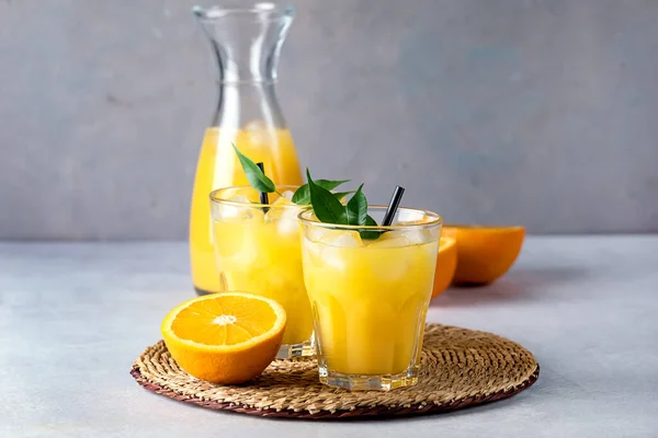 Tasty Refreshing Orange Juice Glass Black Straws Light Gray Background — Stock Photo, Image