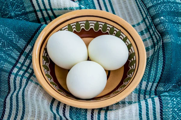 Eggs on a blue background. Top view. Close-up — Stock Photo, Image