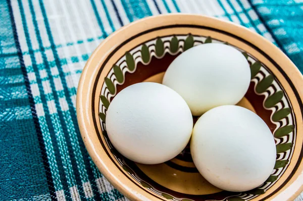 Eggs on a blue background. Top view. Close-up — Stock Photo, Image