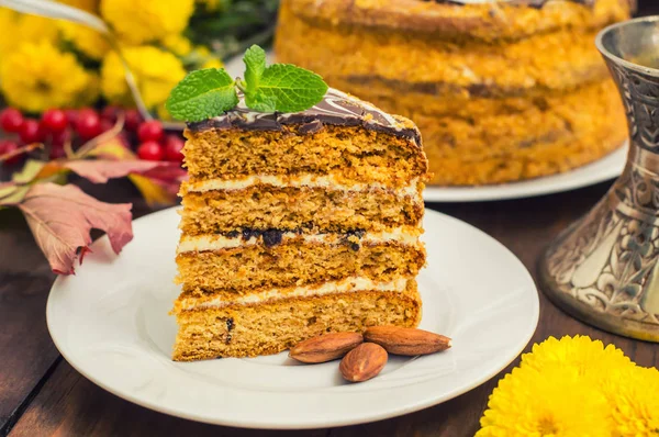 Traditional Hungarian Esterhazy cake .selective focus .  with chocolate piece  a name of the : — Stock Photo, Image