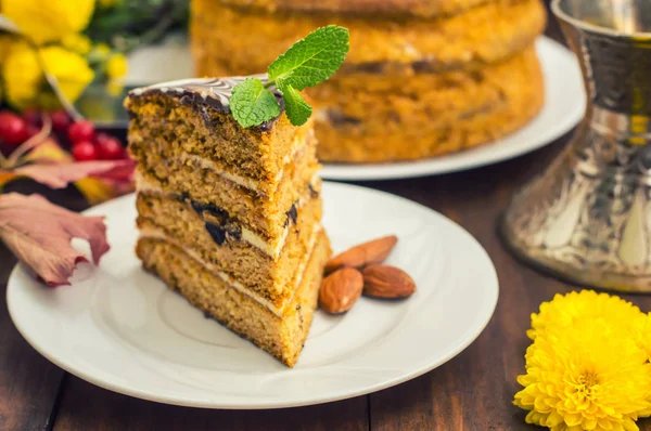 Traditional Hungarian Esterhazy cake .selective focus . with chocolate piece a name of the : — Stock Photo, Image