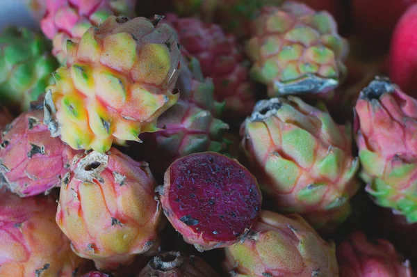 Dragon fruit for sale on farmers market. Agriculture background. Close-up. Top view
