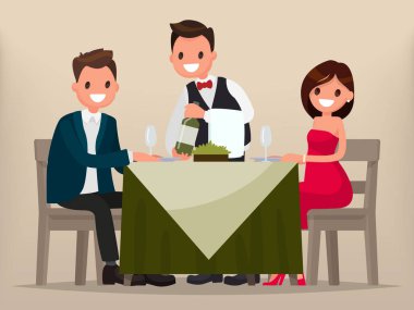 Genç bir çift bir restoranda akşam yemeği. Erkek ve kadın sittin