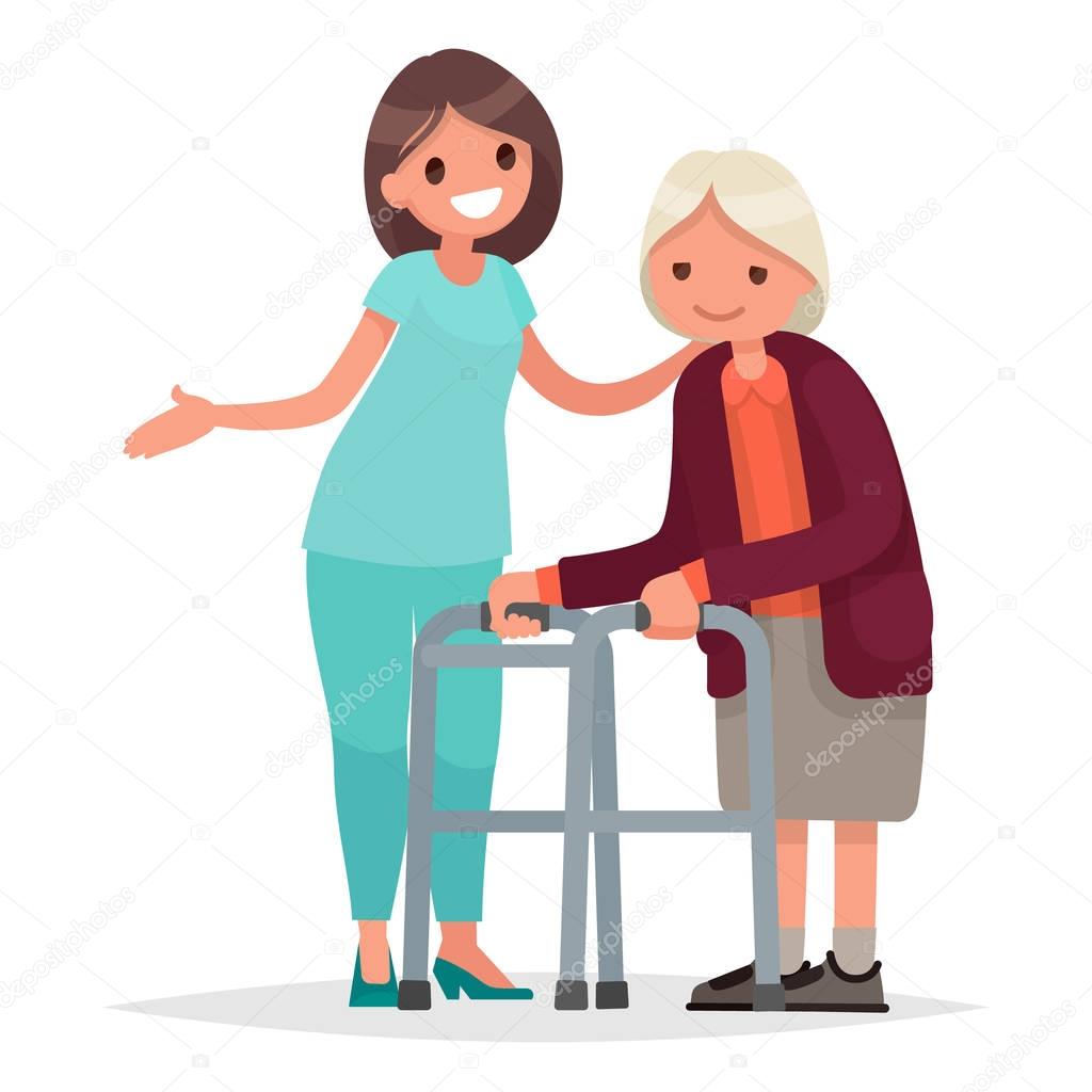 Nurse helps her grandmother to go to the walker. Caring for the 