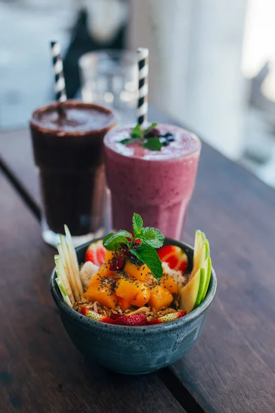 Berry smoothie and coffee and fruit salad — Stock Photo, Image