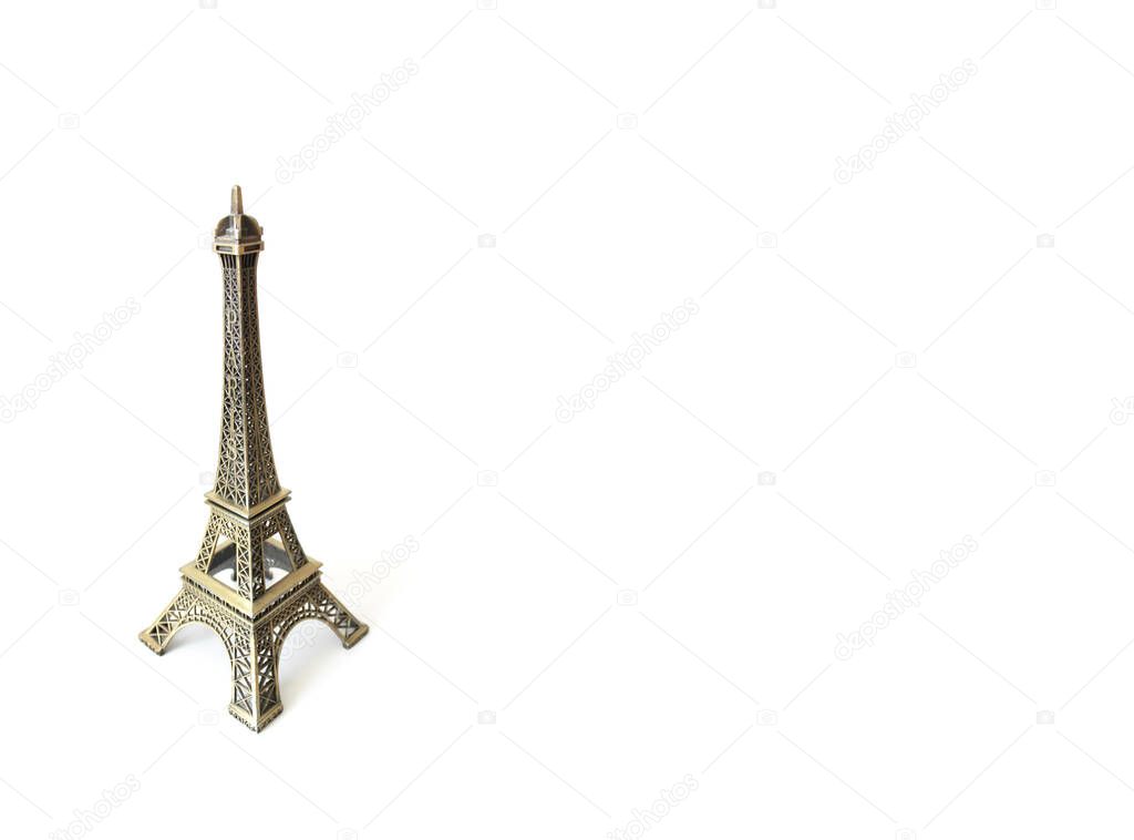 Eiffel tower statuette on a white background