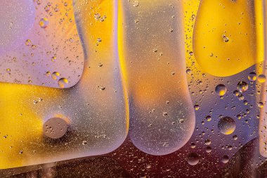 soyut kozmik desen sarı, turuncu, mor, mor damlalar