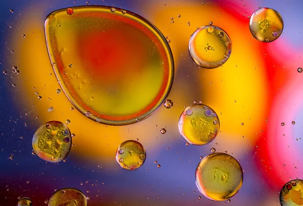 Modello cosmico astratto di gocce gialle, rosse e arancioni — Foto Stock