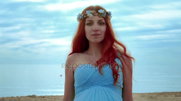 Red hair woman portrait on sea coast. Closeup of redhead woman — Stock Video