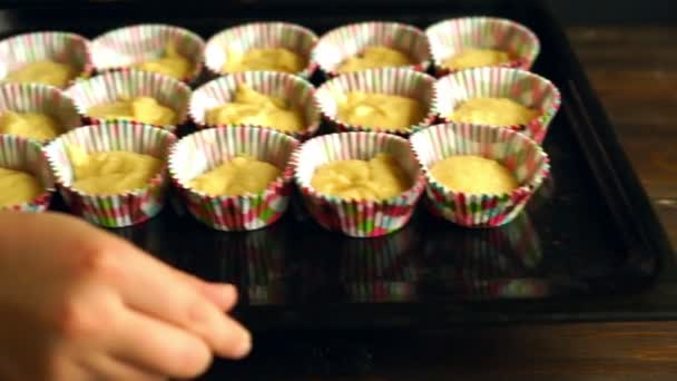 Cooking cupcake. Chef making muffins. Baking muffins. Raw dough cake