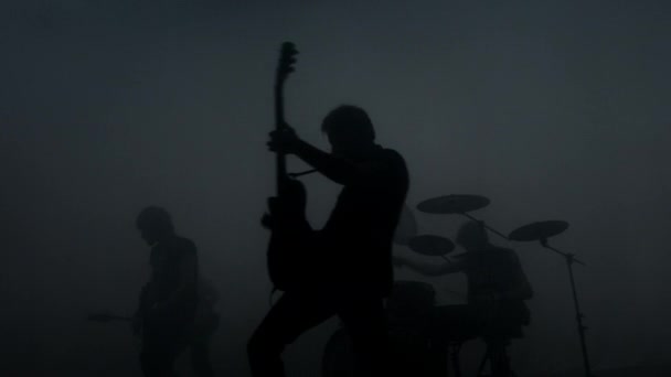 Rock music band concert. Alternative music group silhouettes. Rock musicians — Stock Video