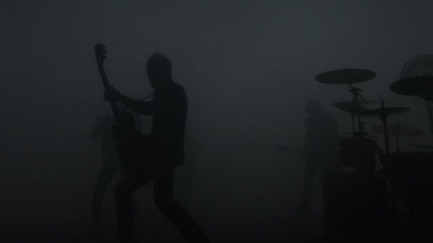 Alternatieve muziek gitaar speler silhouet. Muzikant rockconcert — Stockvideo