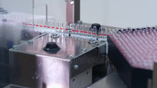 Quality control on pharmaceutical manufacturing line. Pharmaceutical factory — Stock Video