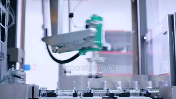 Medicine package on conveyor belt at pharmaceutical factory. Packaging line — Stock Video