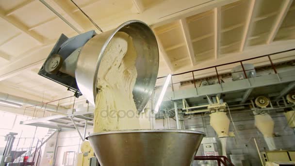Dough mixing machine in bread factory. Wheat flour dough at baking factory — Stock Video