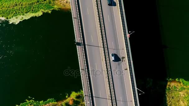 Sky view cars driving on highway road over river. Highway bridge river — Stock Video