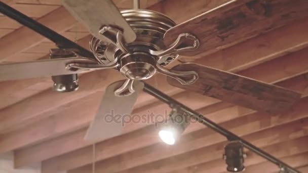 Ceiling fan on wooden roof. Wooden roof background. Cooling fan — Stock Video