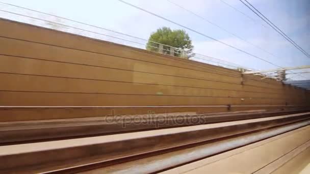 View from the window moving train to railway stations. View from train in tunnel — Stock Video