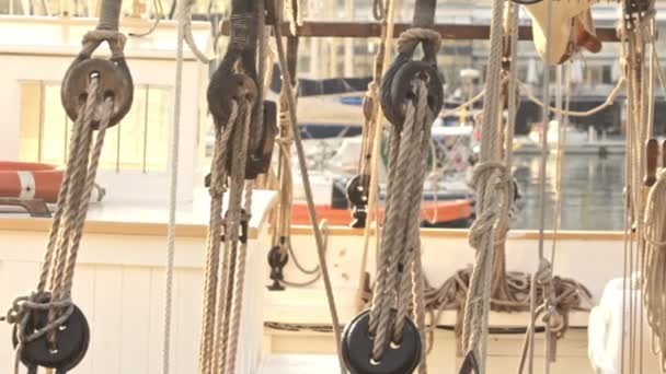 Ropes holding sail on yacht boat. Sailing yacht. Yacht deck — Stock Video